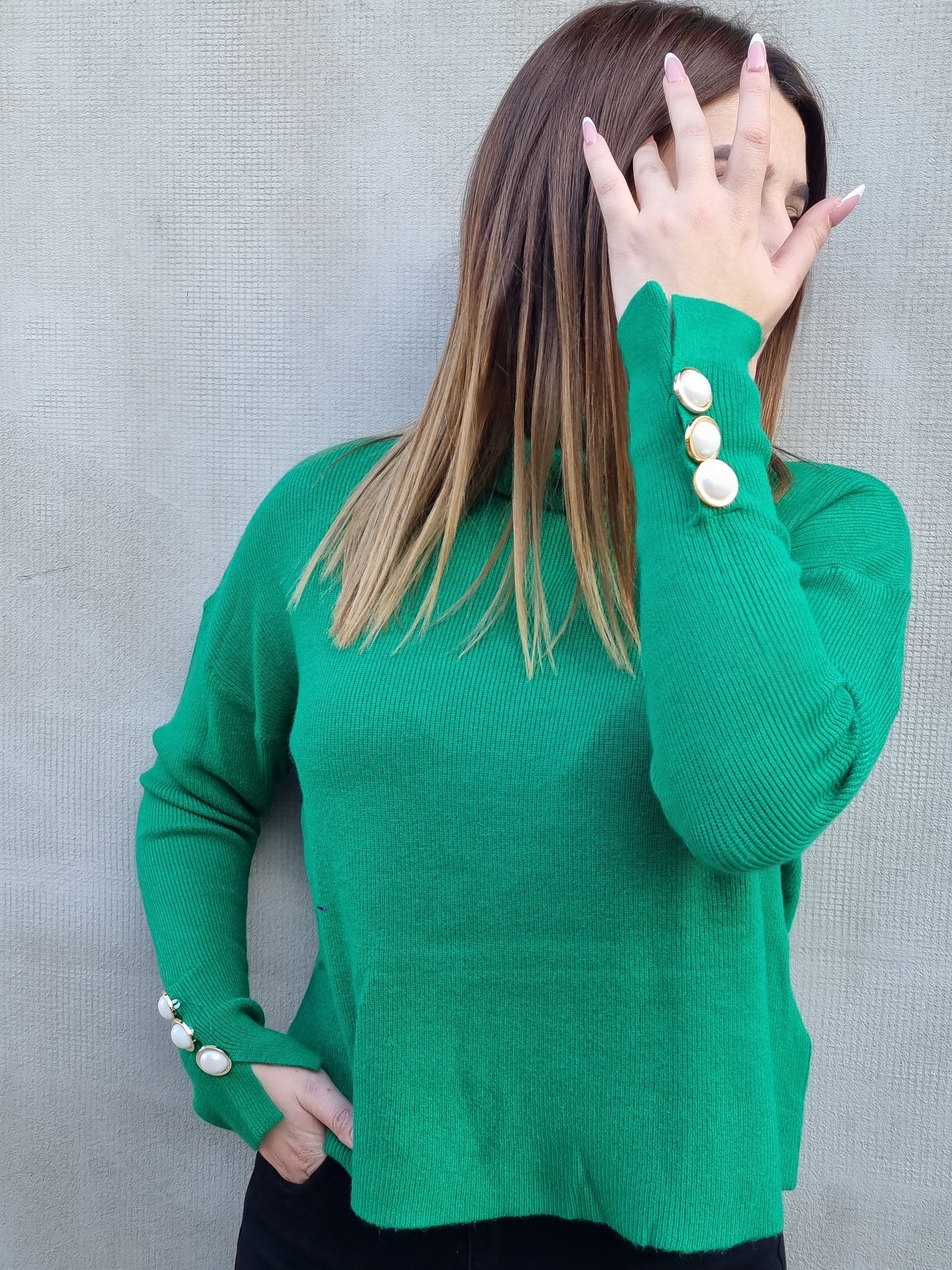 Sweater with pearls on the sleeves