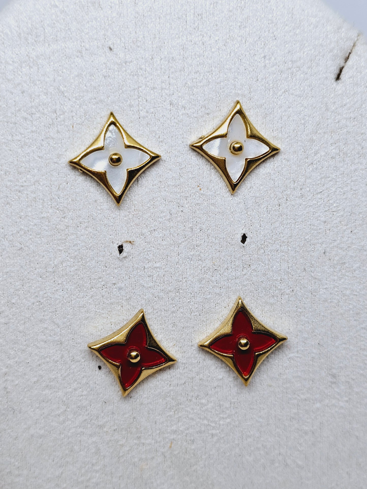 Earrings with a design