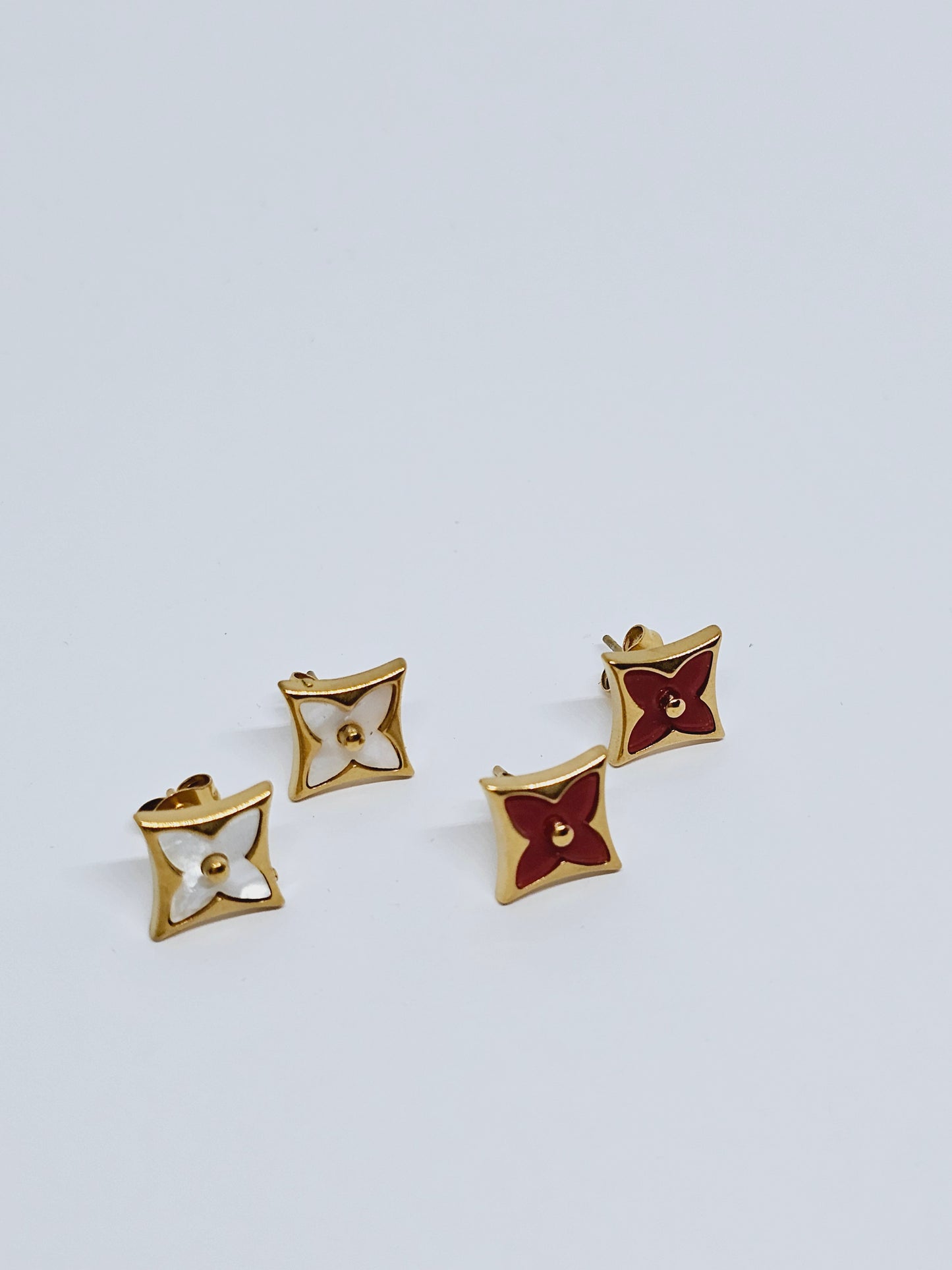 Earrings with a design