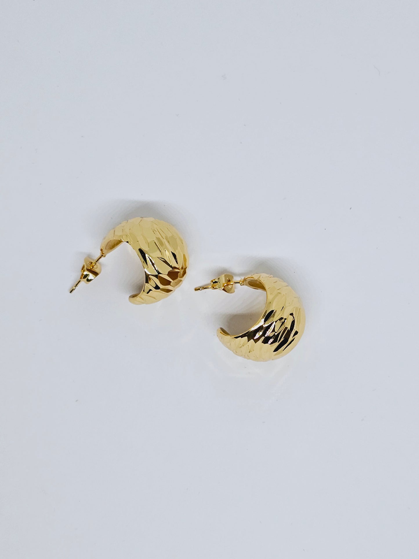 Earrings with a design