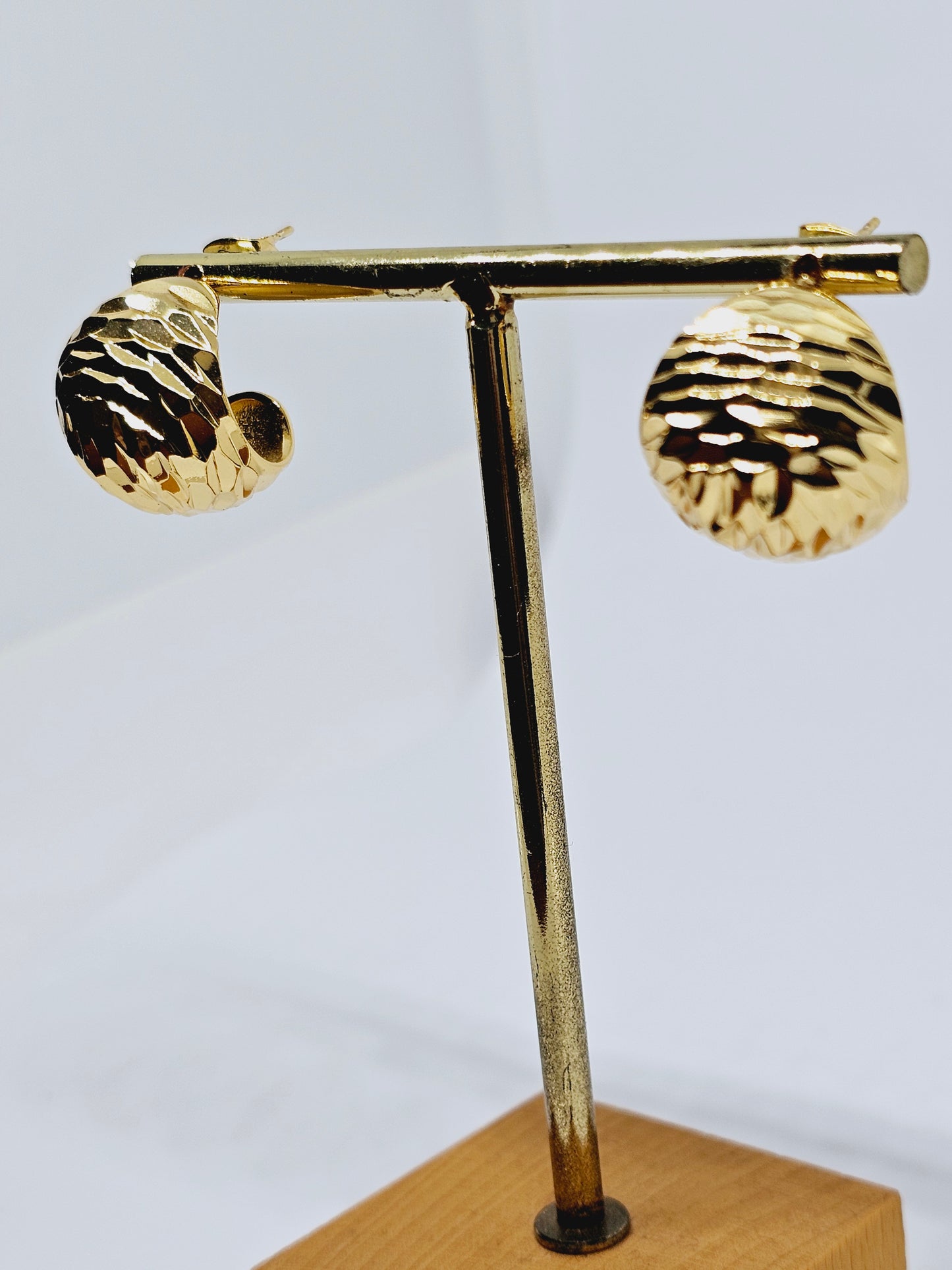 Earrings with a design