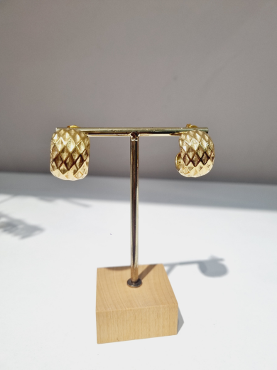 Earrings with a design